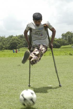 Boy playing football