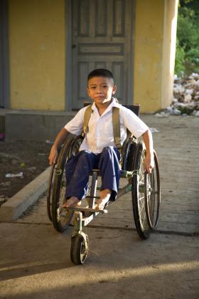 Young boy in wheelchair